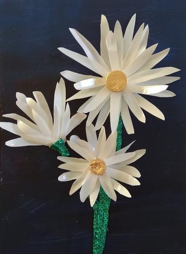 Chris D, Daisies, recycled milk bottles.